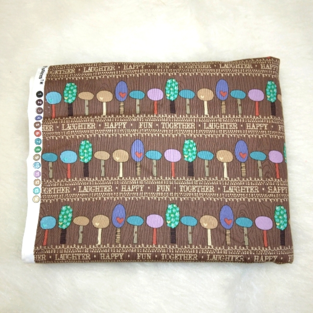 FABRIC Fun and charming stylized trees on Brown, an updated MCM feel